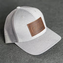 Leather Patch Performance Style Trucker Hat - Bride and Groom Stamp (block)