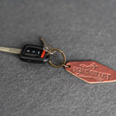 Leather Motel Key Shape Keychain with Wanderlust Stamp Design
