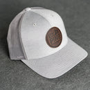 Leather Patch Performance Style Trucker Hat - Ox & Pine Stamp - Circle