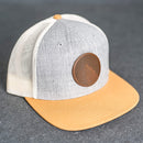 Leather Patch Flat Bill Trucker Hat - Wolf Stamp