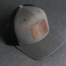 Leather Patch Trucker Style Hat - Mom Cursive Stamp