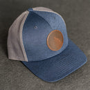 Leather Patch Performance Style Trucker Hat - Wolf Stamp