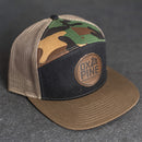 Leather Patch Flat Bill 7 Panel Trucker Hat - Ox & Pine Logo Stamp - Circle