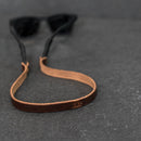 Brown leather sunglasses strap
