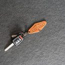 Keychain with a leather tag labeled 'EXPLORE' 