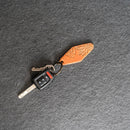 Buy Keychain with brown leather tag