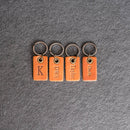 Four leather key tags